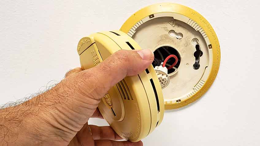 how to turn off hard wired smoke alarm